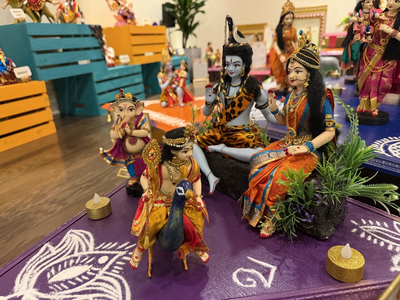 Golu dolls of Shiva, Parvati, Ganesha and Murugan on his peacock